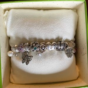 Fabulous Silver 8 Inch Pandora Bracelet with 11 charms included.